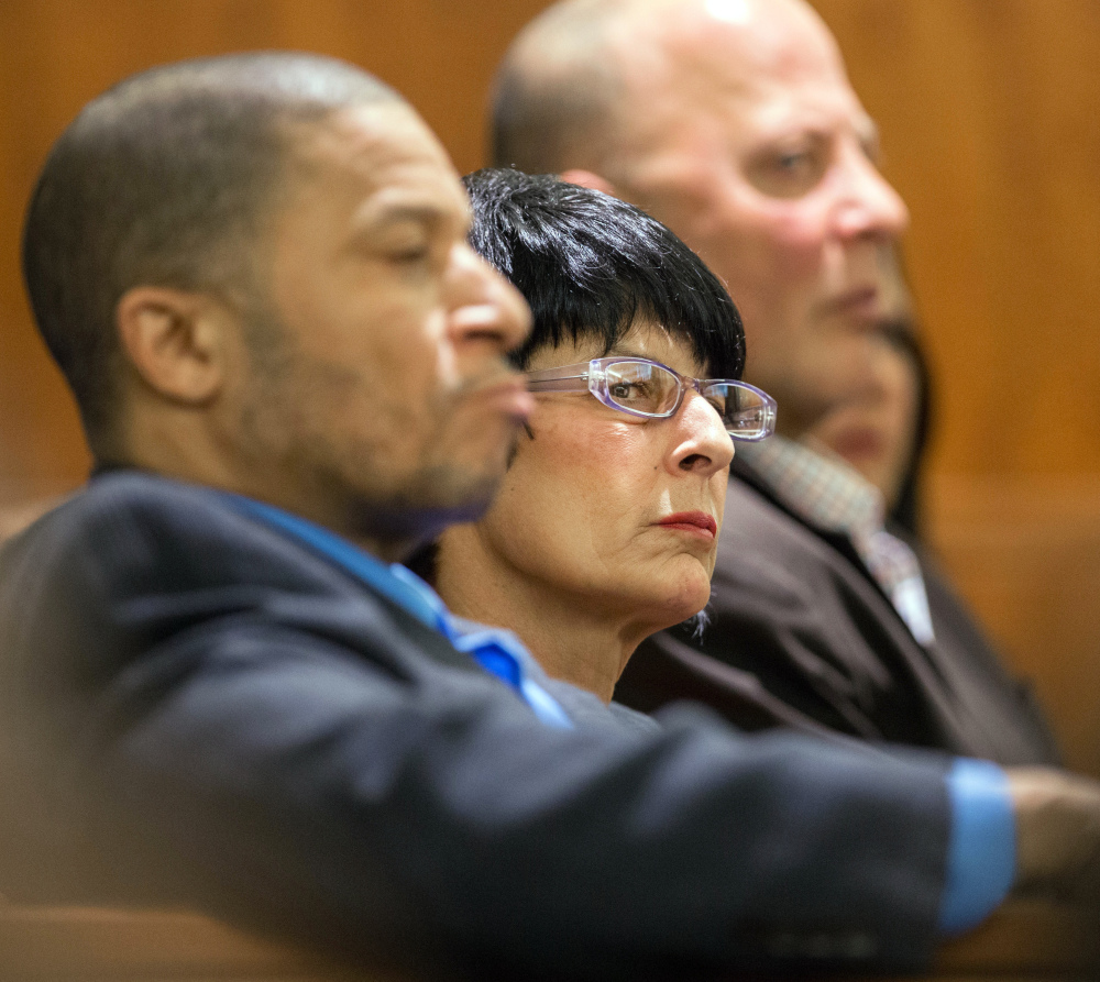 Terri Hernandez, right, listens during the trial of her son, former New England Patriots football player Aaron Hernandez, on Tuesday in Fall River, Mass.