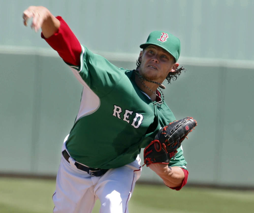 On wearing of the green day, Clay Buchholz allowed four runs, two earned, over four innings Tuesday for the Boston Red Sox in an 11-3 loss to the Atlanta Braves. Buchholz struck out six.
