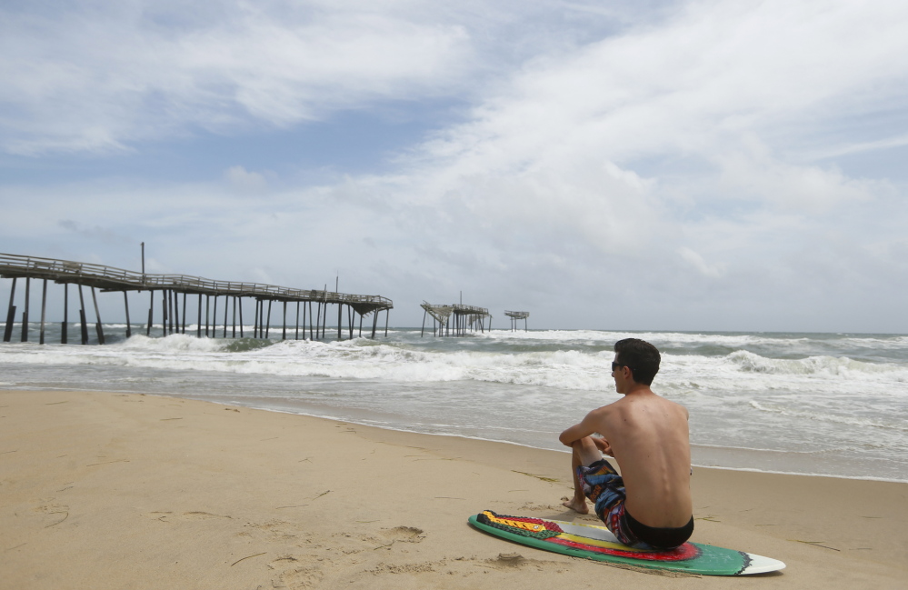 On the beach in Frisco, North Carolina. A proposal to open up some of the East Coast to off-shore drilling has critics warning of catastrophic spills affecting such beaches and the economies of multiple states.