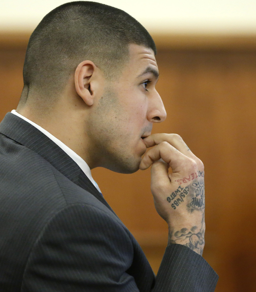 Former New England Patriots football player Aaron Hernandez was portrayed at his trial Thursday as acting aggressively at a nightclub two days before Odin Lloyd was killed.
