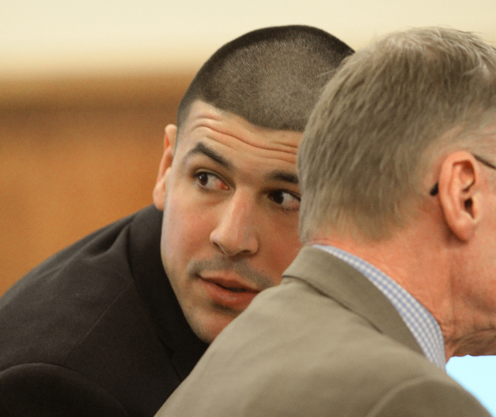 Aaron Hernandez looks toward the gallery during testimony Friday in Fall River, Mass.