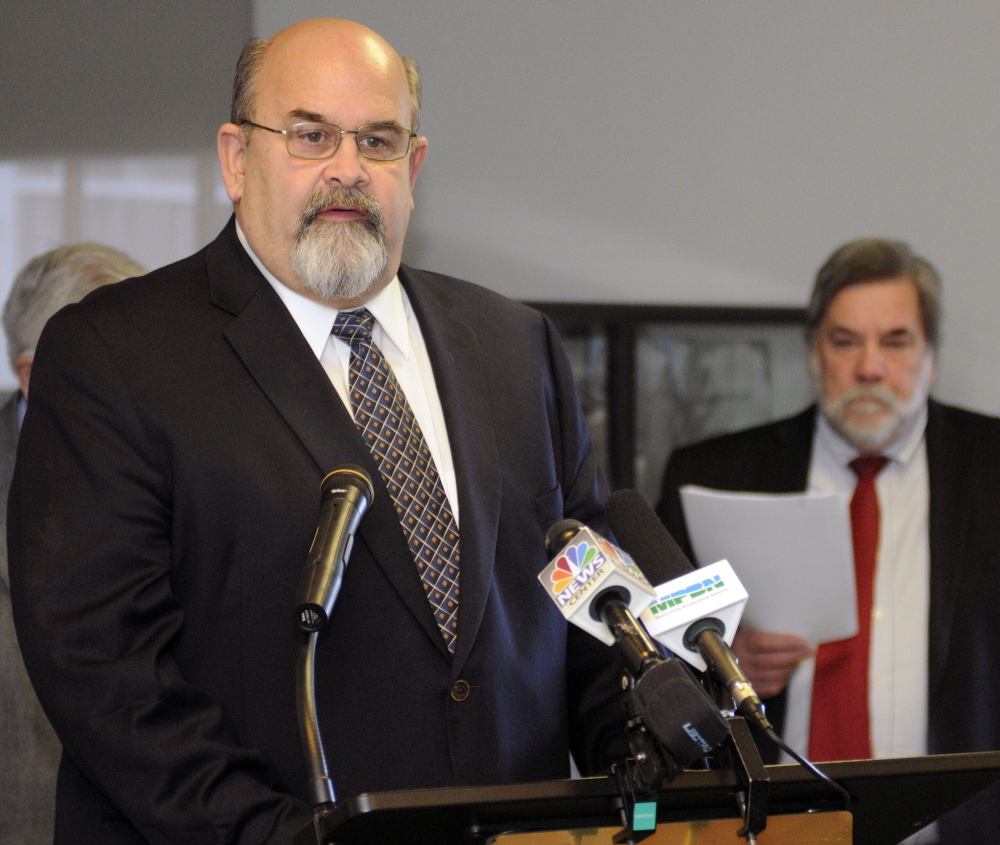 Gardiner Mayor Thom Harnett looks on March 18 as Augusta Mayor Dave Rollins speaks at the Mayors’ Coalition on Jobs and Economic Development news conference. Service-center communities need to show state officials that they’re prepared to develop more efficient ways to provide services.