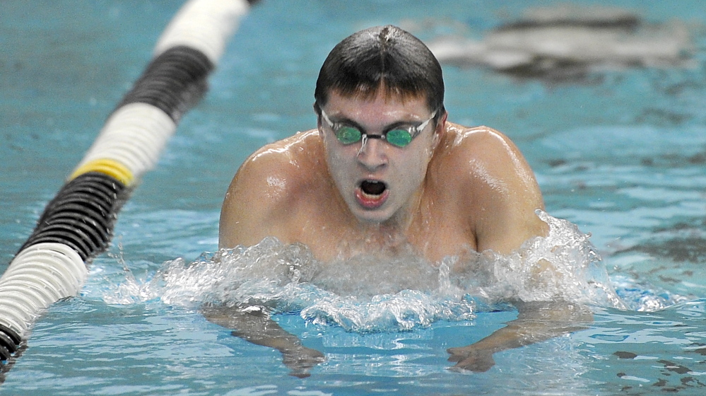 Nate Samson, a junior at Brunswick, works on his breast stroke at Bowdoin’s Leroy Greason Pool. Says Samson: “I like going fast. The practices, they get boring going back and forth, but I love the feeling of racing.”