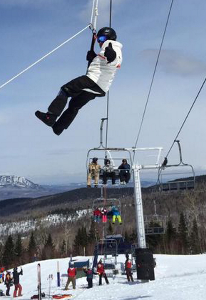 Hank Margolis, of Marlborough, Mass., is evacuated from a chairlift Saturday at the Sugarloaf ski resort in Carrabassett Valley. Margolis said he and his family are regulars at Sugarloaf and were on their 36th day on the mountain when the chairlift malfunctioned.