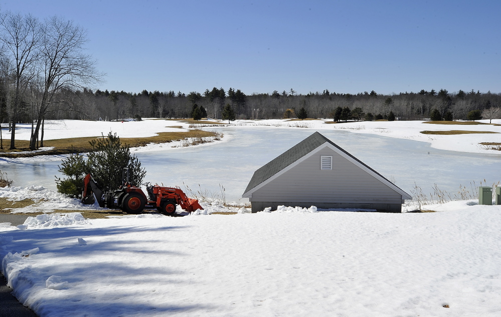 The ponds are still frozen and the course is covered with snow as spring approaches at the Nonesuch River Golf Club, usually one of the first Maine courses to open for the season. Gordon Chibroski/Staff Photographer