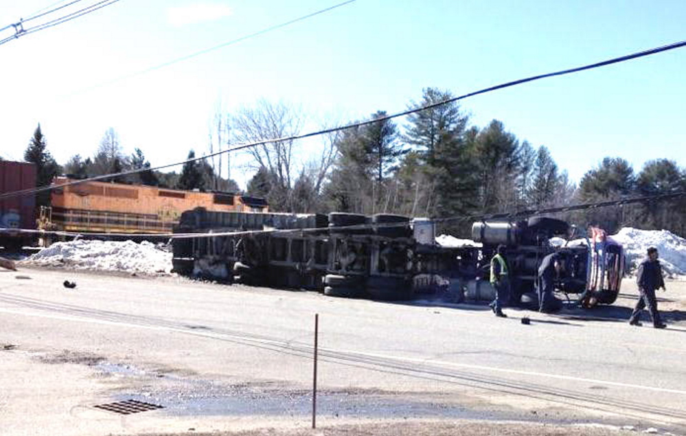 A train and tractor-trailer collided on Hotel Road in Auburn on Monday.