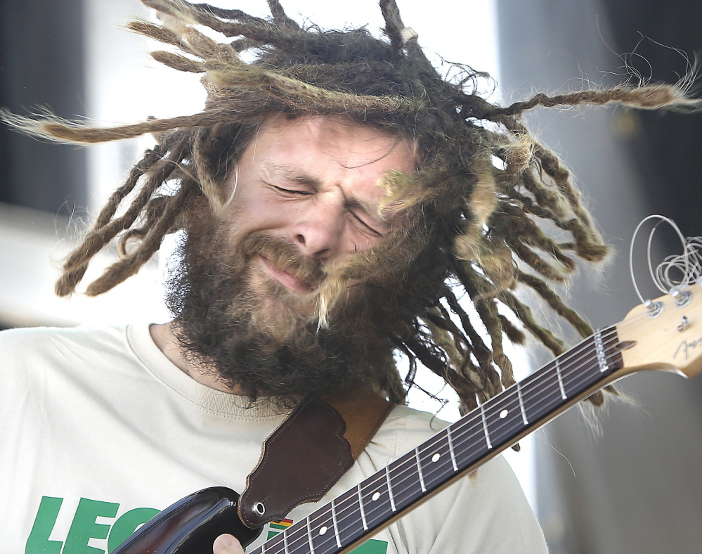 Jay Harris, lead guitarist with Soul Rebel Project, entertains the crowd last August during the first Reggae Festival held at the Maine State Pier in Portland.