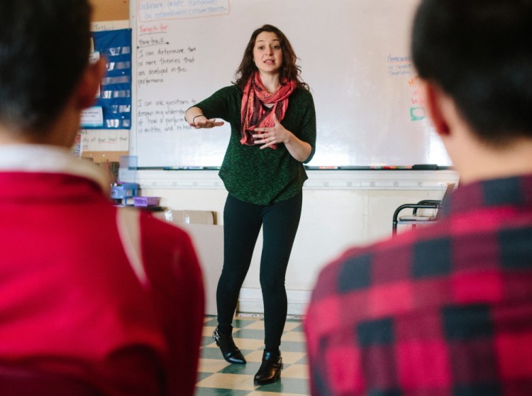 “Basetrack Live” actor Ashley Bloom talks with Lincoln Middle School students Tuesday about her role as a military wife who tells her husband about the death of his best friend through Facebook.