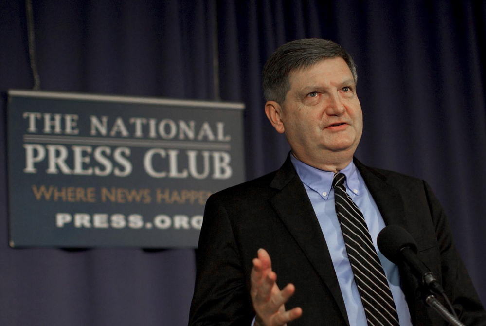 James Risen, a Pulitzer Prize-winning reporter who’s been pressured to disclose confidential sources, speaks to reporters at the National Press Club in Washington, D.C., in August 2014.