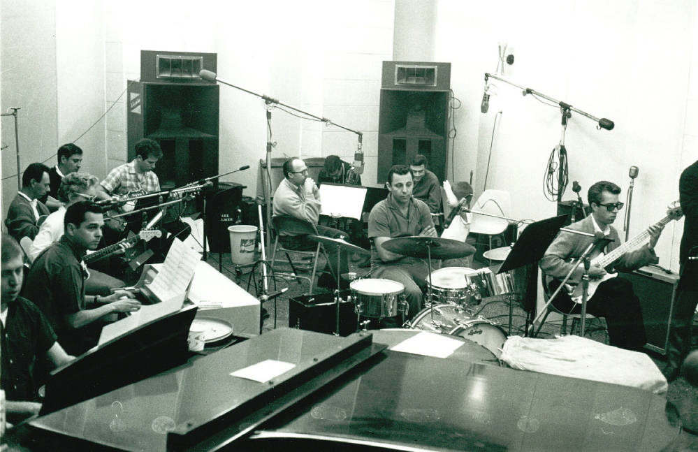 Members of the Wrecking Crew in a recording session.