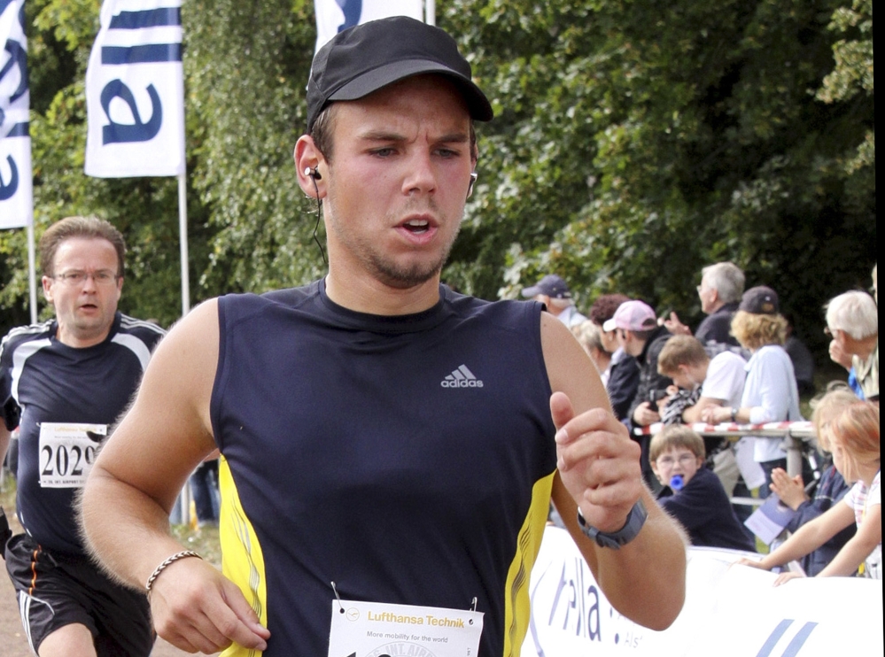 Andreas Lubitz competes in a run in Germany last fall. The  Germanwings co-pilot took medical leave from an elite flight school in 2009 and told his girlfriend he was planning a specatcular gesture.