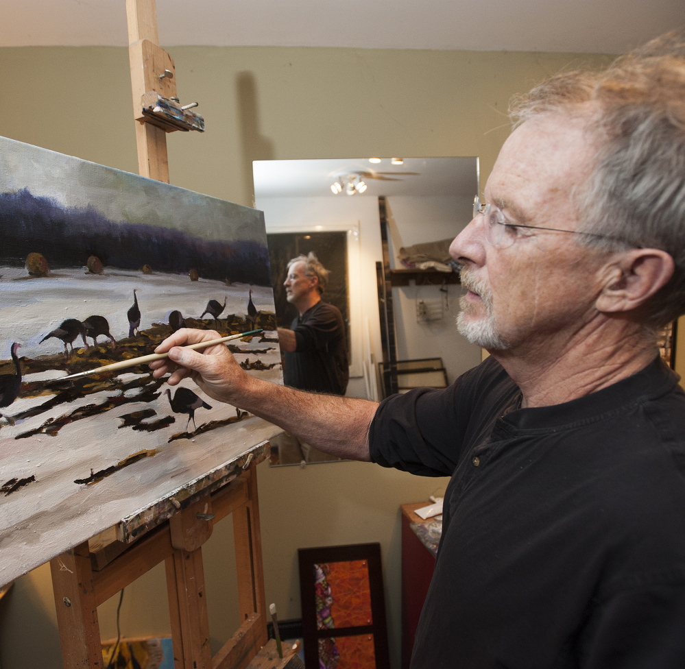 Former defense attorney-turned-Assistant Attorney General John Alsop works in his Cornville home studio on a painting of wild turkeys in a snow-covered field.