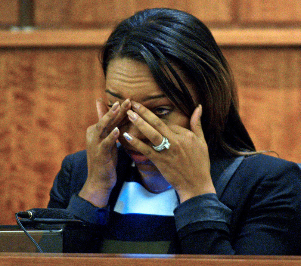 Shayanna Jenkins, fiancee of former Patriots player Aaron Hernandez, cries as she testifies in court during Hernandez’s murder trial Monday in Fall River, Mass.