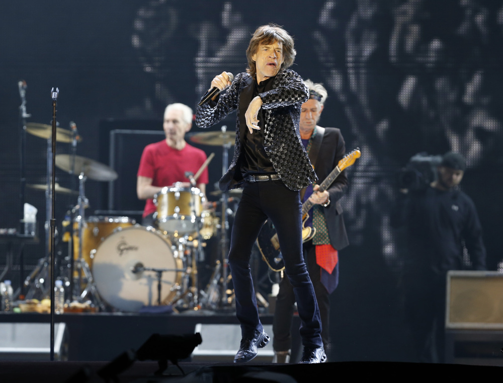 This Feb. 26, 2014 file photo shows Mick Jagger and the Rolling Stones performing during their concert at Tokyo Dome in Tokyo.
