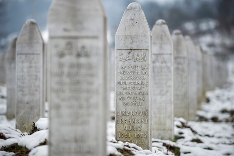 The gravestone of Muriz Sinanovic in the memorial cemetery Potocari, outside Srebrenica.  Sinanovic was among the Muslim Bosnian men and boys killed in the July 1995 Srebrenica massacre.