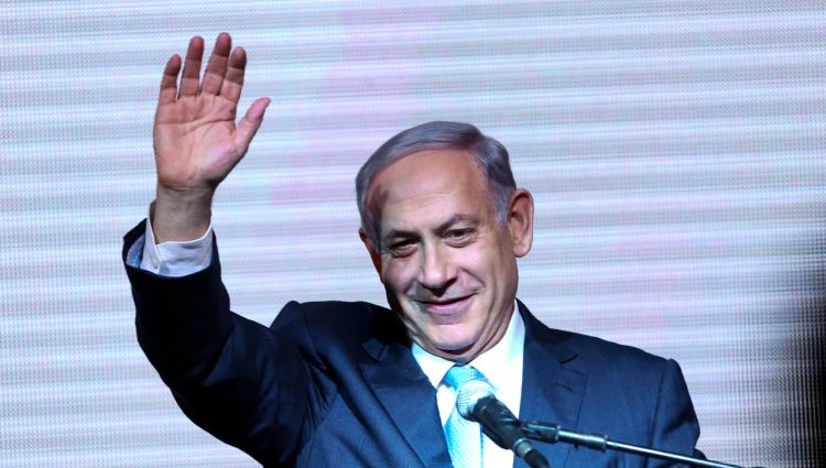 Israeli Prime Minister Benjamin Netanyahu greets supporters at the Likud Party's election headquarters In Tel Aviv. Wednesday. Exit polls Tuesday showed the Likud and Isaac Herzog’s center-left Zionist Union  deadlocked but once the actual results came pouring in early Wednesday, Likud soared forward to claim 30 seats in Parliament. The Zionist Union wound up with just 24 seats. The Associated Press