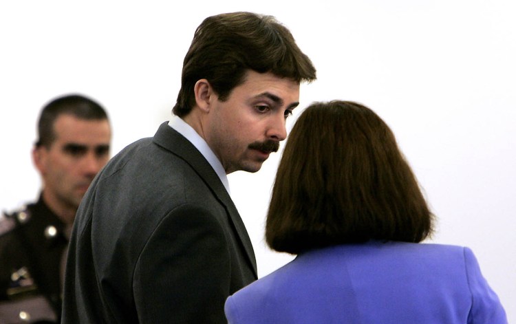 William Flynn talks to his defense lawyer Cathy Green, in Rockingham Superior Court in Brentwood, N.H., in this 2008 photo. The Associated Press