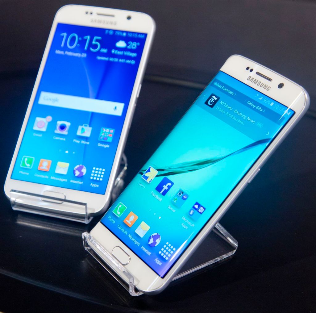 Samsung's new phones, the Galaxy S6, left, and Galaxy S6 Edge. The Associated Press