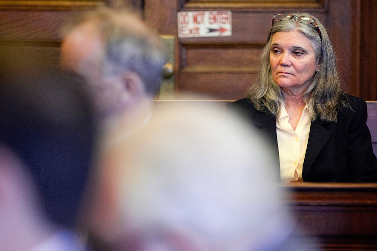 Karen Thurlow-Kimball, wife of defendant Merrill "Mike" Kimball, sits in the Cumberland County Courthouse at the start of her husband's murder trial. She testified Monday.