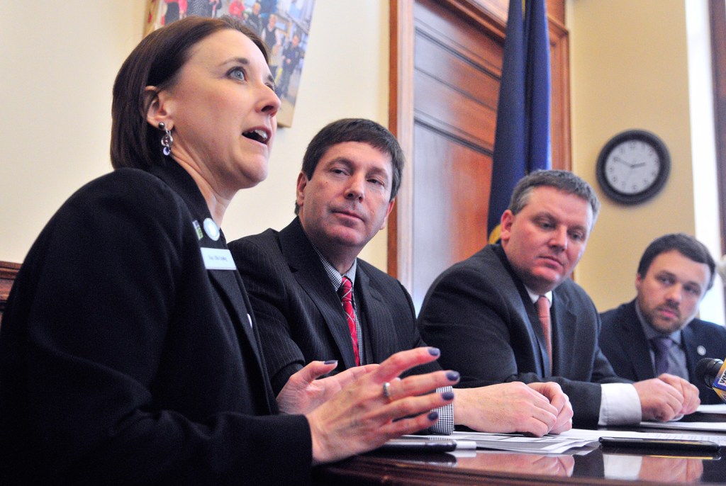 From left, Rep. Ellie Espling of New Gloucester, the Republicans' assistant leader in the House, House Republican leader Ken Fredette of Newport, Senate President Mike Thibodeau of Winterport, and Senate Republican leader Garrett Mason of Lisbon Falls speak about the new Democratic budget plan during a news conference Thursday at the State House. The lawmakers were reserved in their response to the Democrats’ announcement, which appeared to catch them by surprise.
