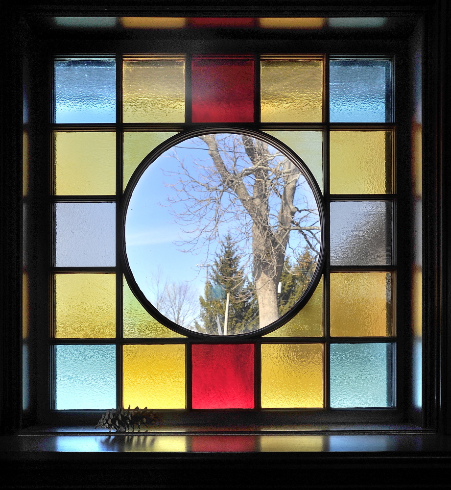 The fireplace and the stained-glass windows in the castle, built as a warming hut in 1894, were refurbished in 2005.