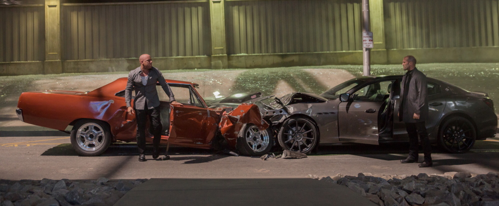 Vin Diesel, left, as Dom Toretto and Jason Statham as Deckard Shaw in “Furious 7.”