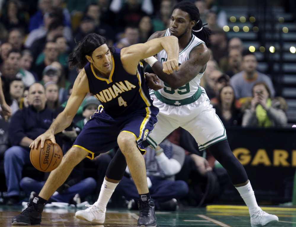 Indiana Pacers forward Luis Scola makes a move against Celtics forward Jae Crowder during the first half of Wednesday night’s game in Boston. Crowder started and finished a fourth-quarter rally for the Celtics.