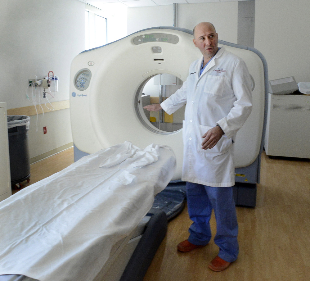 A radiologist at Mercy Hospital in Portland, Dr. David Langdon demonstrates how the CT scan machine is used to detect lung cancer. Researchers say early detection can decrease lung cancer deaths by 20 percent. Meanwhile, according to the International Association for the Study of Lung Cancer, a patient diagnosed with late-stage lung cancer has only a 5 percent chance of living another five years, compared with about 50 percent if the cancer is caught earlier.