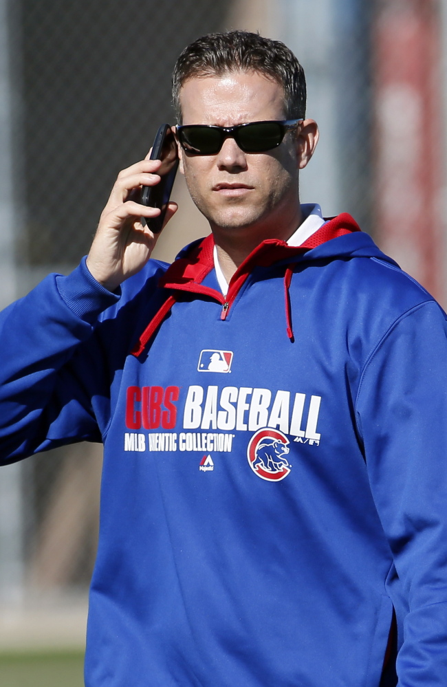 Theo Epstein is seeking to build the Cubs through a farm system while the Red Sox, his former team, continue to throw money around to remain competitive each season.