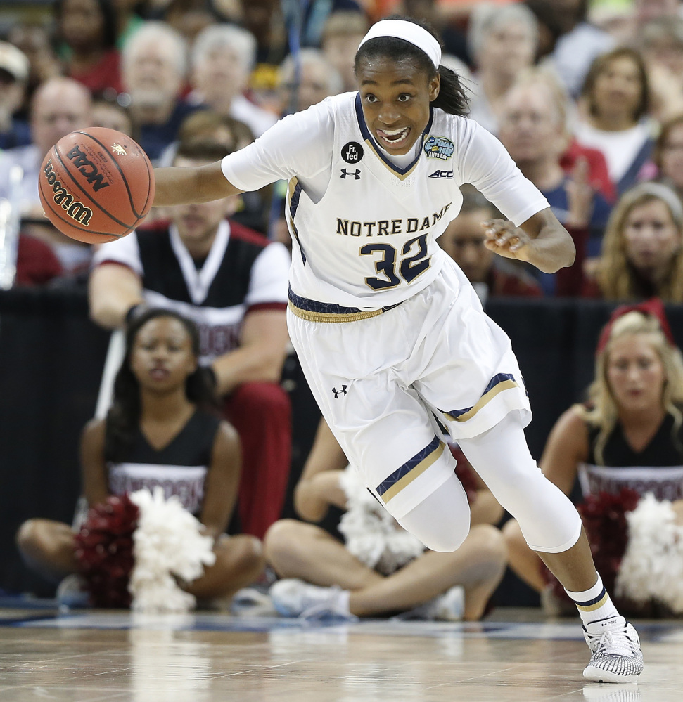 Notre Dame guard Jewell Loyd (32) drives against South Carolina during the second half of the NCAA Women’s Final Four tournament college basketball semifinal game, Sunday,, in Tampa, Fla.
