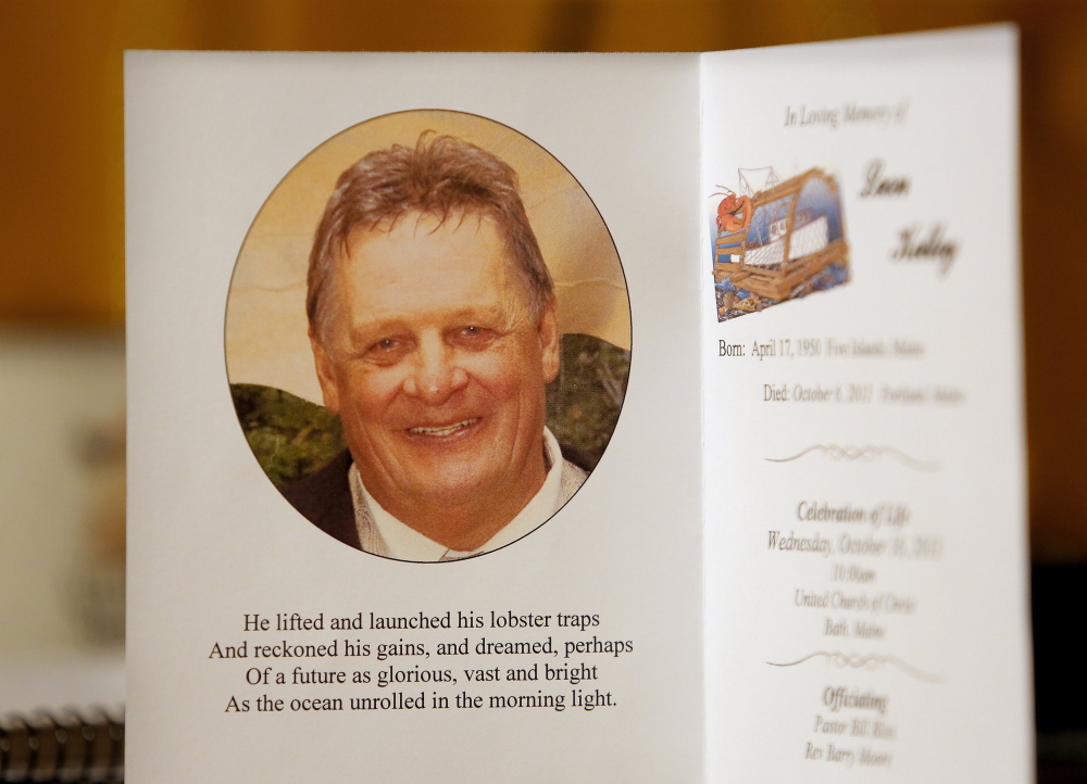 Gabe Souza/Staff Photographer
A picture of Leon Kelley appears in his funeral program, photographed at his brother Joseph Kelley’s house in Woolwich on Nov. 13, 2013.