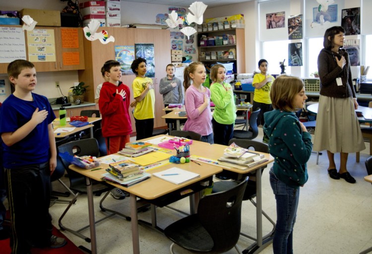 With hands over hearts, the way it’s been since 1942, fourth-graders in Robin Reinhold’s homeroom at South Portland’s Brown Elementary School start the day with the Pledge of Allegiance.