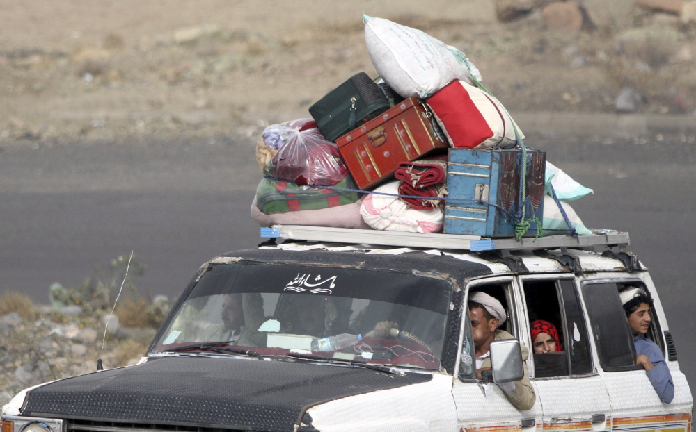 People flee Sanaa in Yemen. The World Health Organization says 100,000 fled their homes as fighting intensified. Dozens of children are among the hundreds killed. More will die if medical supplies do not reach Yemen, a Red Cross official warns.