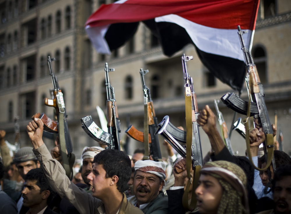 Shiite rebels, known as Houthis, protest against Saudi-led airstrikes in Sanaa, Yemen, on Friday. Lawmakers in Pakistan on Friday unanimously voted to stay out of the Saudi-led air coalition targeting the rebels.
