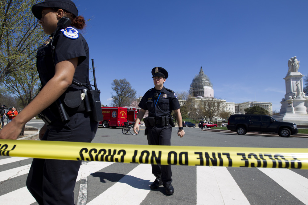 U.S. Capitol Police officers work a perimeter at the U.S.  Capitol in Washington on Saturday.
