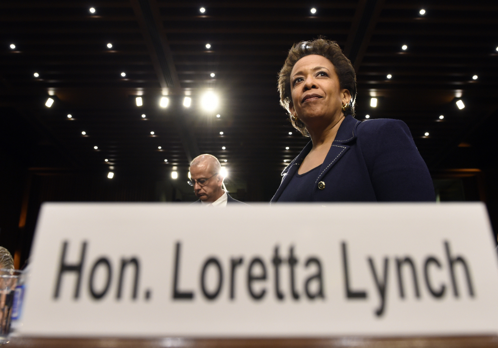 Attorney General nominee Loretta Lynch waits for a confirmation vote as the Senate first considers Medicare funding and a potential Iran nuclear deal.