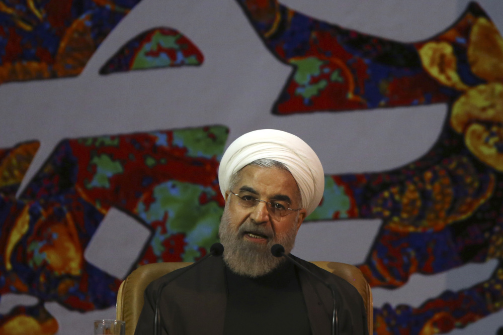 Iranian President Hassan Rouhani speaks at a ceremony to commemorate the late Khadijeh Saghafi, wife of late revolutionary founder Ayatollah Khomeini, in Tehran, Iran, Sunday.