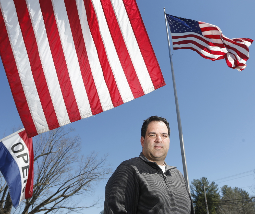 Derek Auclair runs the family-owned Gorham Flag Center, which was started by his great-uncle in 1965.