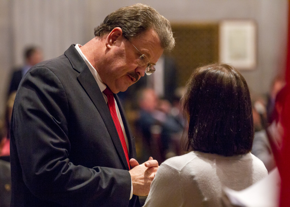 Tennessee Rep. Jerry Sexton, R-Bean Station, speaks with a colleague on the House floor in Nashville on Wednesday.
