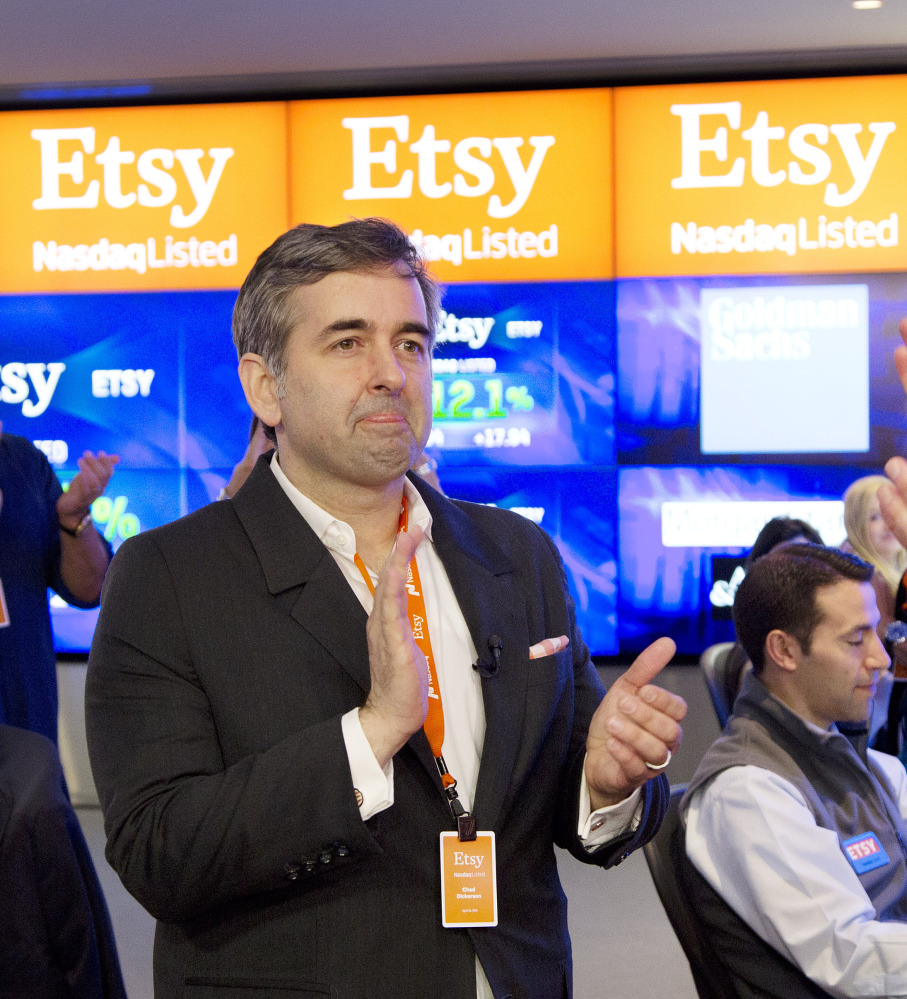 Etsy CEO Chad Dickerson applauds as his company’s shares open for trading Thursday. The IPO raised about $300 million.