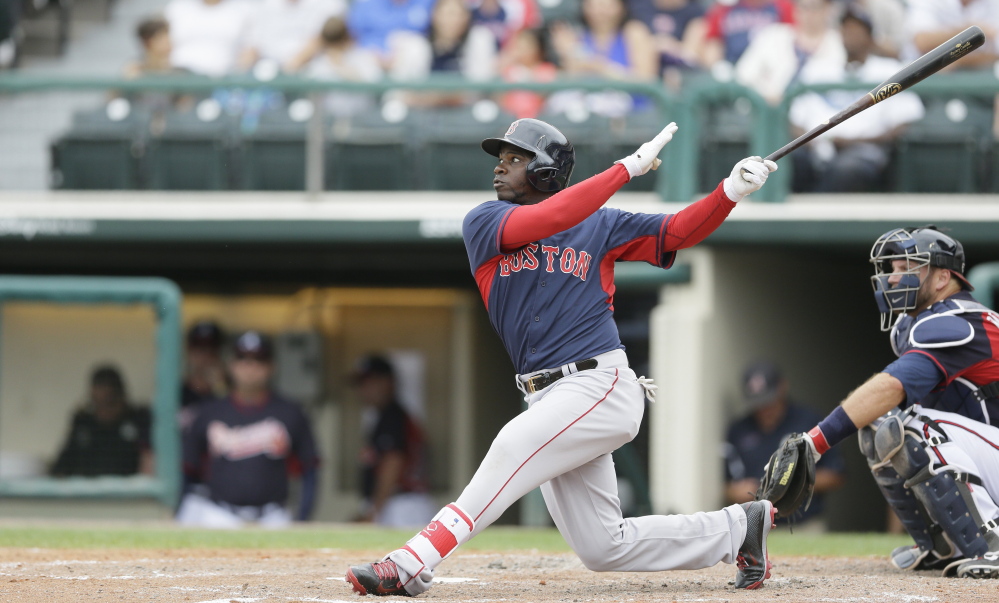 Boston's Rusney Castillo bats during a spring training exhibition baseball game against the Atlanta Braves in Kissimmee, Fla., on March 27. The Associated Press