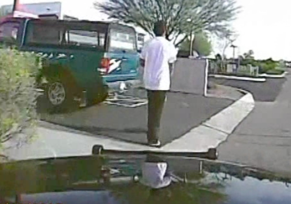A dash-cam video shows the suspect about to get hit by the police cruiser.