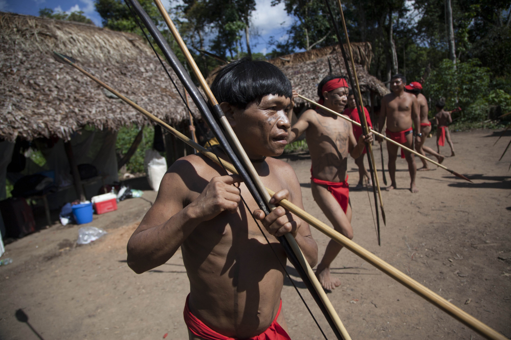 Yanomami Indians dance in Venezuela’s Amazon region. Scientists have discovered that members of an isolated village have the most diverse bacteria ever reported.
