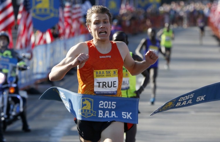 Ben True wins the men’s division in the Boston Marathon 5K on April 18. He qualified for the finals in the 5,000 meters at the track and field world championships Wednesday in Beijing.