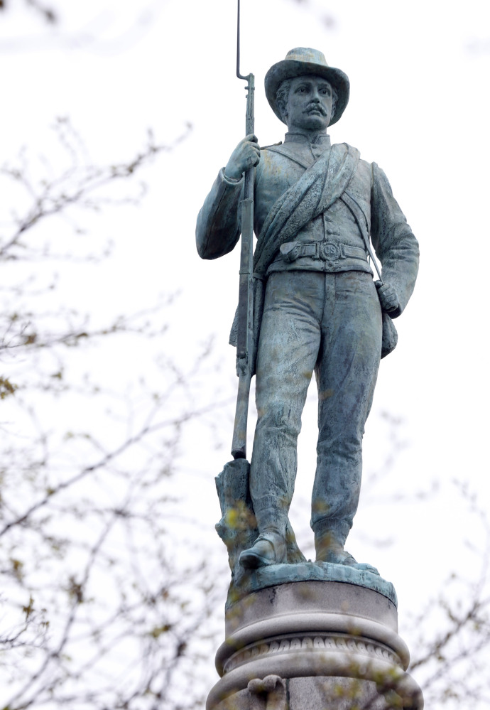 The statue atop The Confederate Soldiers and Sailors Monument in Richmond, Va., is one of thousands on Civil War monuments in more than 30 states.