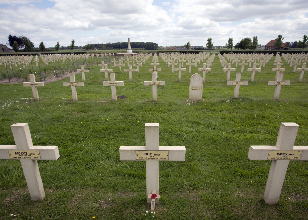 Graves of French and French colonial World War I soldiers are seen at the Saint-Charles de Potyze Cemetery in Zonnebeke, Belgium. More than 90,000 soldiers were killed by poison gas during that war. The Associated Press