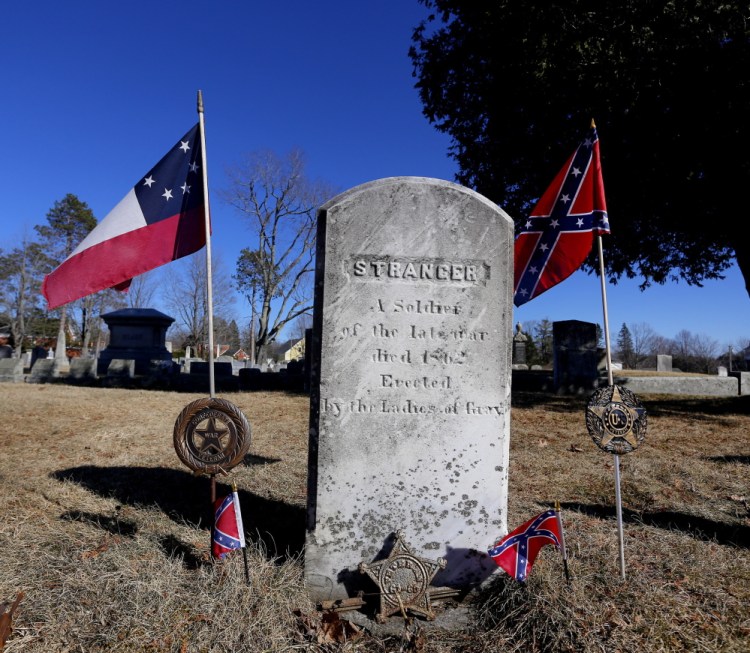 A headstone engraved "Stranger" marks the grave of an unknown Confederate soldier in the Gray Village Cemetery. The grave site was supposed to be for Lt. Charles H. Colley, whose final resting spot is unclear. The unknown soldier's grave is marked by small Confederate flags, a gesture first requested in the 1950s by a Georgia resident.