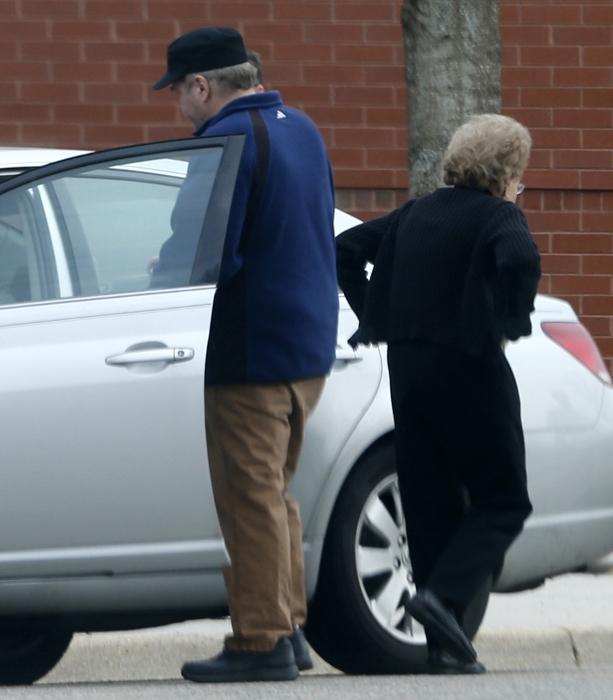 John Hinckley gets into his mother’s car in front of a recreation center in Williamsburg, Va. For the past year, Hinckley has spent 17 days a month at his mother’s home.