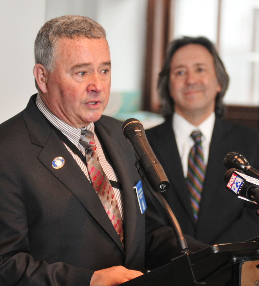 Rep. Gary L. Hilliard, R-Belgrade, left, speaks on Tuesday about an arsenic testing bill he is sponsoring.