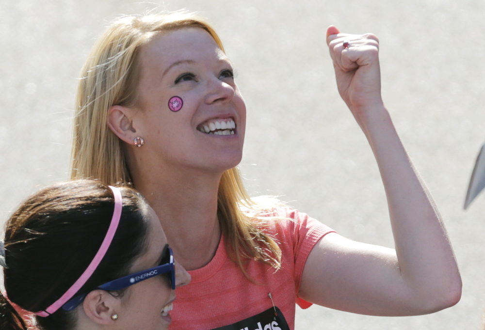 Adrianne Haslet-Davis celebrates after crossing the finish line of the 118th Boston Marathon on April 21, 2014, a year after she and her husband suffered severe injuries in the bombings. Haslet-Davis gave graphic testimony Wednesday during the penalty phase of Dzhokhar Tsarnaev’s trial in Boston.